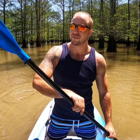 David N. Brace. Relationship expert and writer. In the image he is kayaking through a bayou